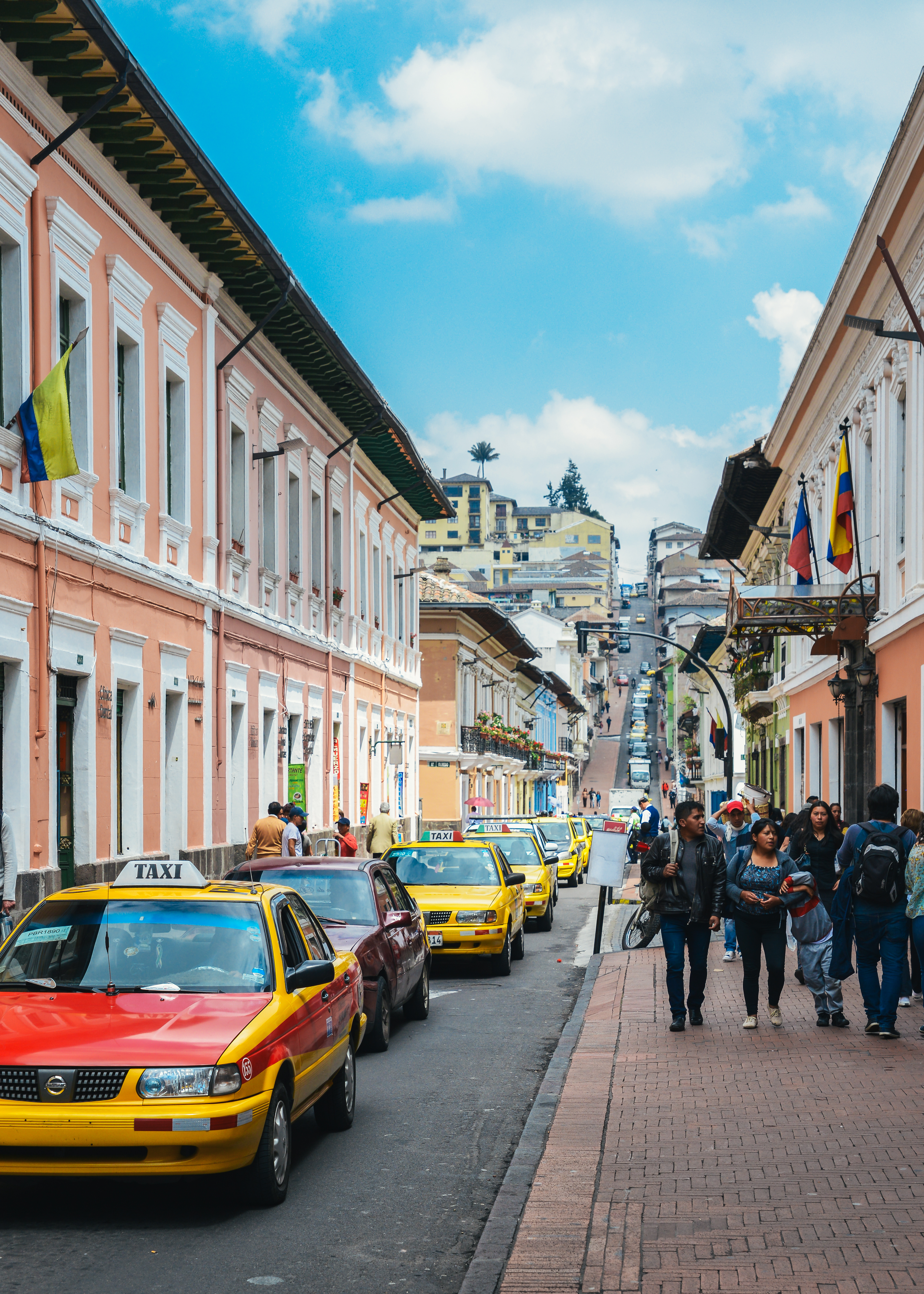 ecuador street with taxis