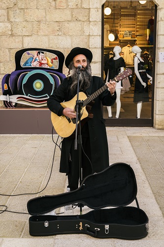 jewish man playing guitar