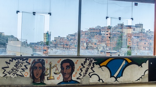 Graffiti overlooking Cantagalo favela in Rio de Janeiro, Brazil