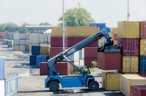 A truck picks up a container for import and export business