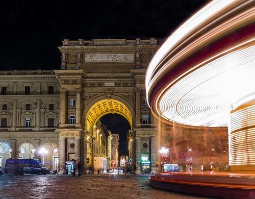 Long exposure of carousel at night in  Florence, Tuscany, Italy