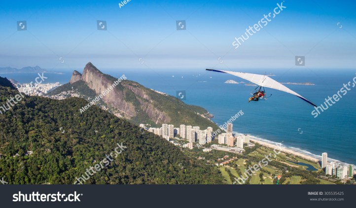 stock-photo-rio-de-janeiro-brazil-hang-gliding-flight-305535425