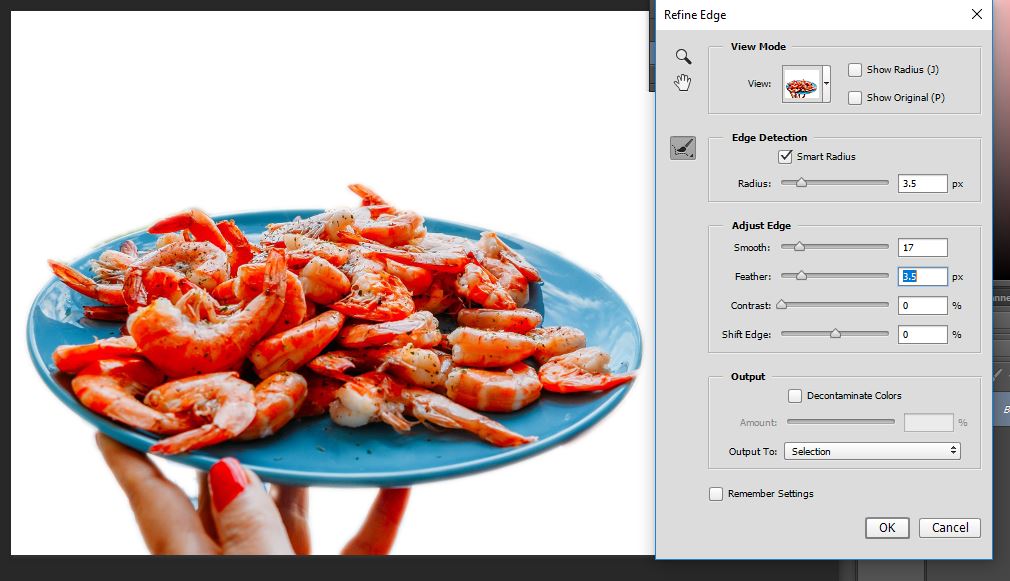 stock-photo-plate-of-shrimps-prawns-with-a-city-background-695905048