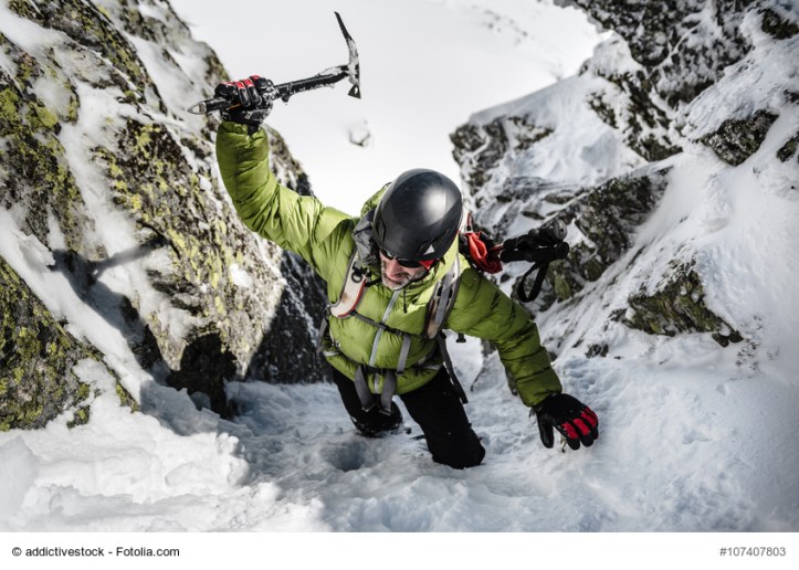 Man trekking on a snowy mountain