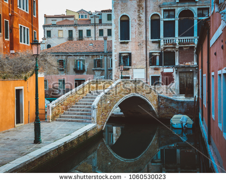 stock-photo-colorful-bridge-across-canal-in-venice-italy-1060530023
