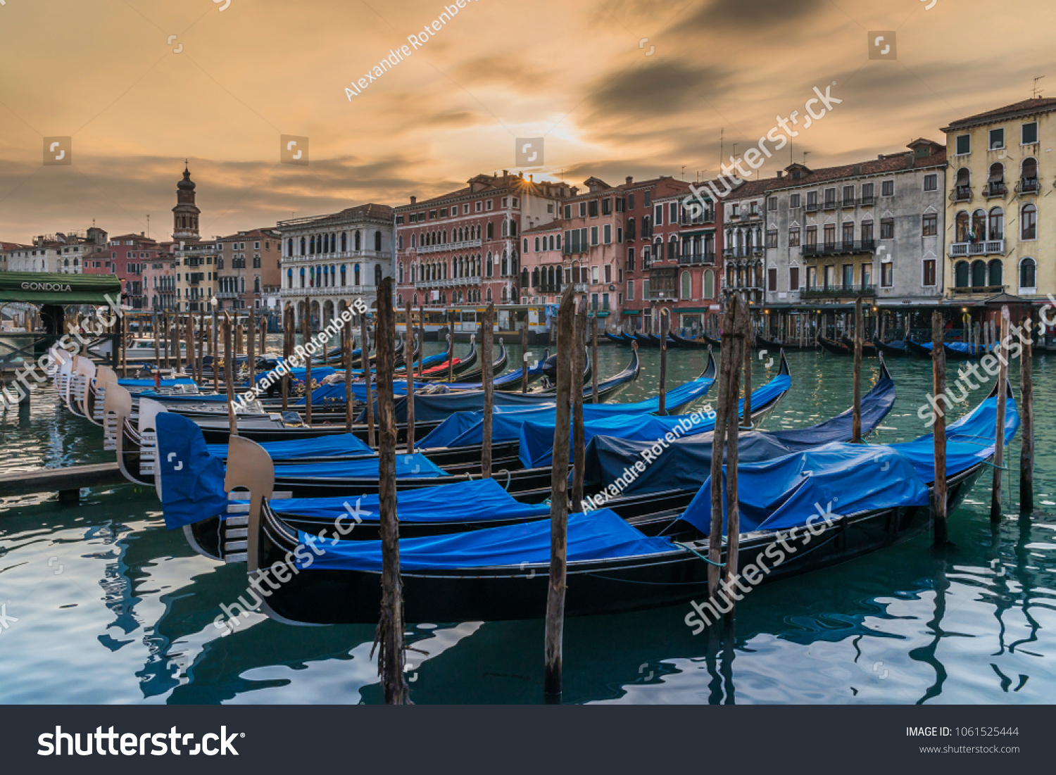 stock-photo-venice-italy-march-moored-gondolas-on-the-canal-grande-in-venice-italy-1061525444