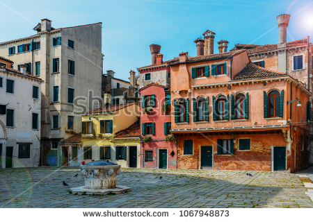 stock-photo-colourful-and-historic-houses-at-the-campo-della-maddalena-in-venice-italy-with-a-variety-of-1067948873