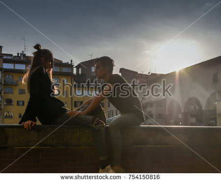 stock-photo-florence-italy-october-th-silhouette-of-young-couple-next-to-ponte-vecchio-in-florence-754150816