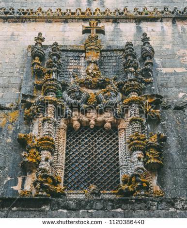 stock-photo-tomar-portugal-june-facade-of-the-convent-of-christ-with-its-famous-intricate-1120386440