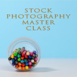 Stack of colorful crayons in cup with copy space