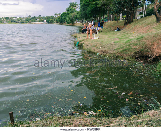 belo-horizonte-dec-26-2017-afro-brazilian-women-fish-on-pampulha-lake-KW69RF