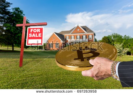 stock-photo-businessman-or-finance-executive-in-suit-offering-bitcoin-to-purchase-large-single-family-home-697263958