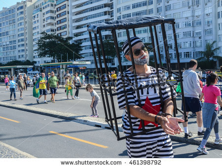 stock-photo-rio-de-janeiro-brazil-july-st-protestors-gather-on-copacabana-beach-to-vent-their-461398792