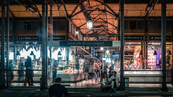 Long exposure view of entrance to the covered San Miguel market in Madrid, Spain