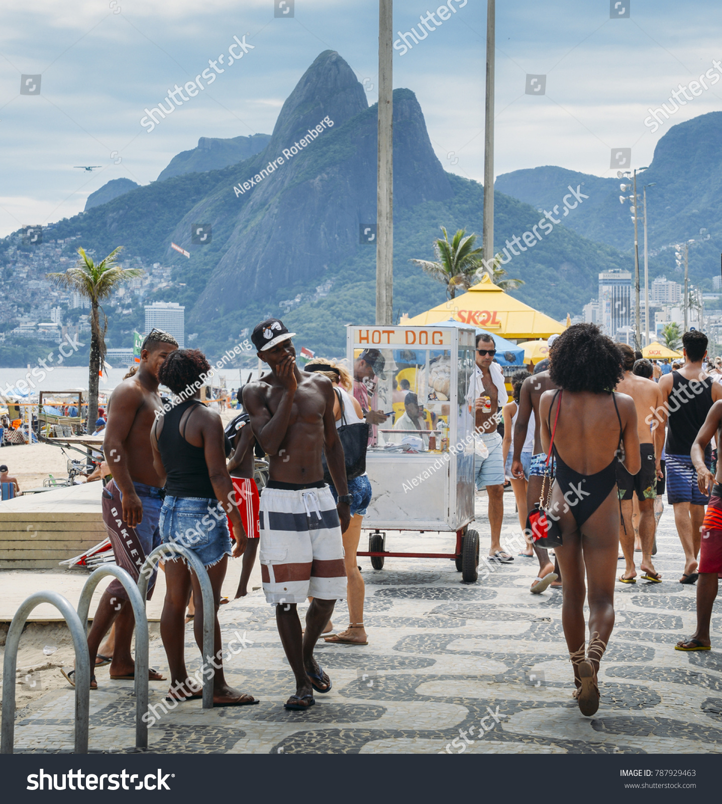 stock-photo-rio-de-janeiro-brazil-jan-man-checks-out-beautiful-afro-brazilian-woman-walking-down-787929463